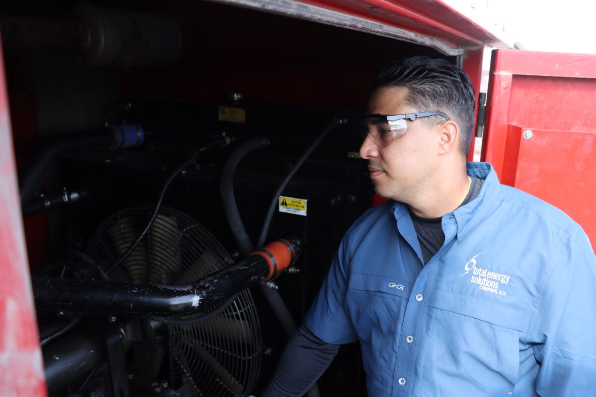 Total Energy Solutions Technician maintaining a generator